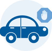 Car stopped next to a stop symbol